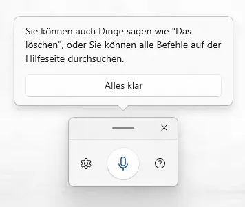 Infokarte der Spracheingabe mit dem Text „Sie können auch Dinge sagen wie ‚Das löschen', oder Sie können alle Befehle auf der Hilfeseite durchsuchen" und einem Button „Alles klar", darunter die Spracheingabeleiste
